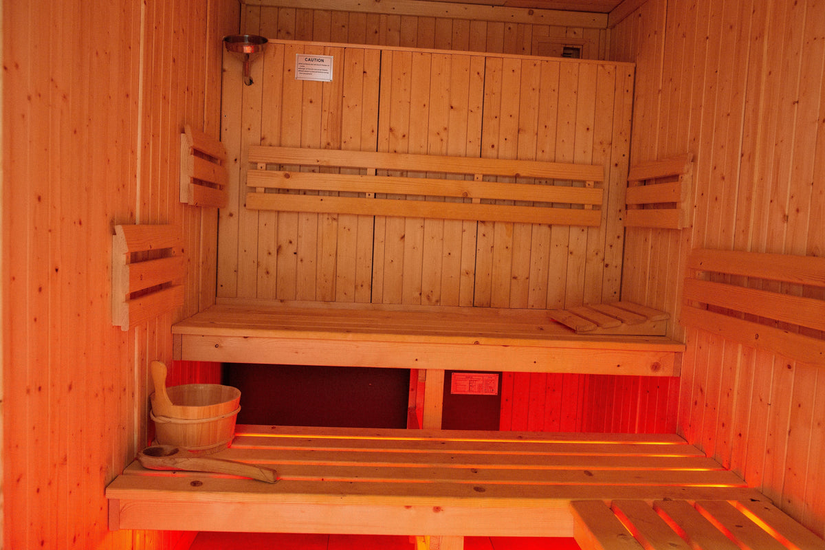 Luxury wooden sauna room at Rinto Fitness Richmond for post-workout recovery and relaxation.